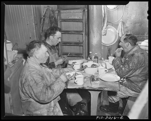 Untitled photo, possibly related to: Provincetown, Massachusetts. Aboard the Frances and Marion, a Portuguese drag trawler, fishing off Cape Cod. Dinner aboard
