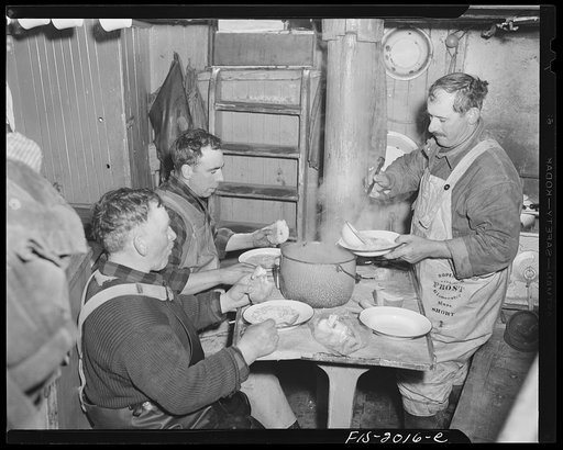 Provincetown, Massachusetts. Aboard the Frances and Marion, a Portuguese drag trawler, fishing off Cape Cod. Dinner aboard