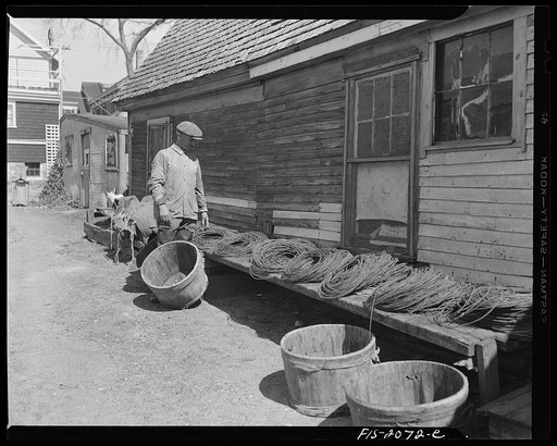 Provincetown, Massachusetts. Portuguese dory fisherman drying his lines