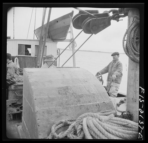 Untitled photo, possibly related to: Provincetown, Massachusetts. Aboard the Frances and Marion, a Portuguese drag trawler, fishing off Cape Cod. All hands hauling in the trawl