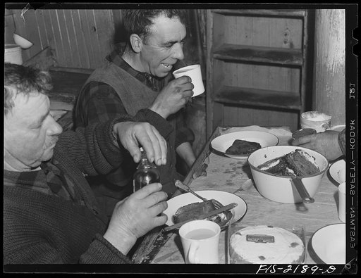 Untitled photo, possibly related to: Provincetown, Massachusetts. Breakfast aboard the Portuguese trawler Frances and Marion