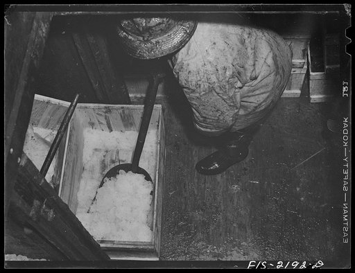 Untitled photo, possibly related to: Provincetown, Massachusetts. Aboard the Frances and Marion, a Portuguese drag trawler, fishing off Cape Cod. The ice hold