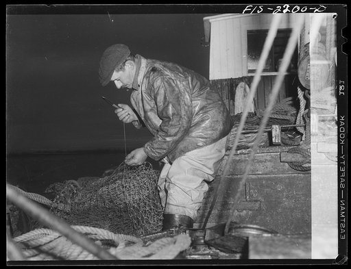 Untitled photo, possibly related to: Provincetown, Massachusetts. Aboard the Frances and Marion, a Portuguese drag trawler, fishing off Cape Cod. All hands hauling in the trawl