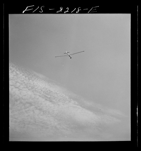 Parris Island, South Carolina. U.S. Marine Corps glider detachment training camp. Glider plane being towed through the sky