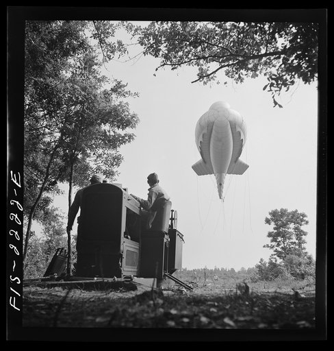 Parris Island, South Carolina. Tactical formations of barrage balloons prevent dive bombing and the strafing of important ground installations. The Leathernecks are developing an excellent technique in this method of protecting important locations from enemy aircraft
