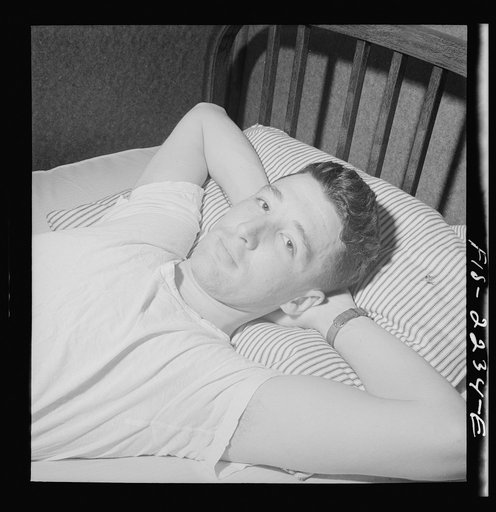 Untitled photo, possibly related to: Parris Island, South Carolina. An instructor at leisure after a full day at the U.S. Marine Corps glider detachment training camp