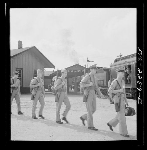 Untitled photo, possibly related to: Parris Island, South Carolina. U.S. Marine Corps glider detachment training camp. Recruits on their way to the camp
