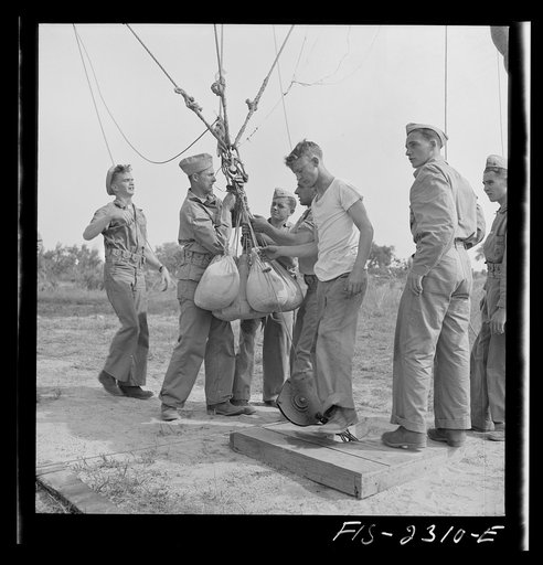 Parris Island, South Carolina. Special Marine units in training at Parris Island are learning how to bed down a big barrage balloon