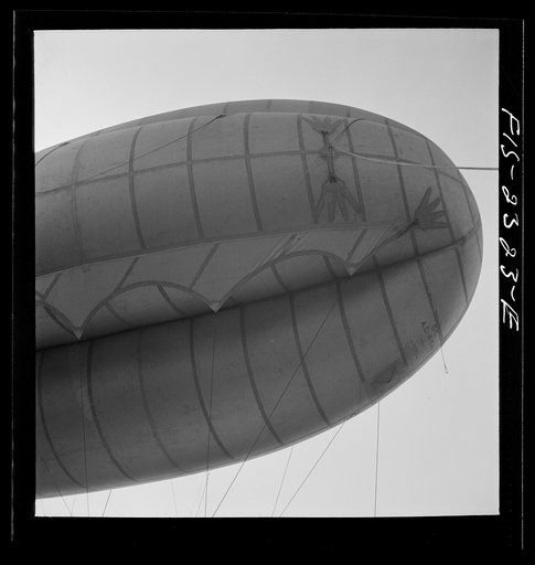 Camp Lejeune, New River, North Carolina. A view of the barrage balloon, showing the curtain and the finger patches to which they attach handling lines