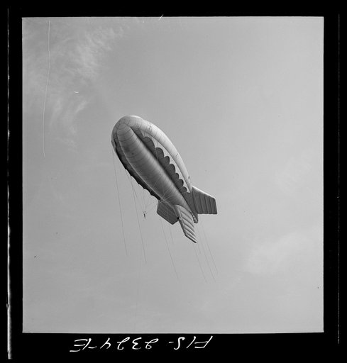 Parris Island, South Carolina. Tactical formations of barrage balloons prevent dive bombing and the strafing of important ground installations. The Leathernecks are developing an excellent technique in this method of protecting important locations from enemy aircrafts