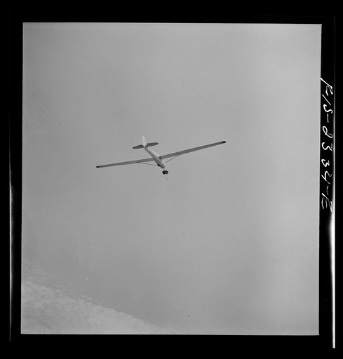 Parris Island, South Carolina. U.S. Marine Corps glider detachment training camp. Glider plane being towed through the sky