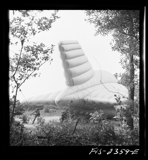 Parris Island, South Carolina. Special United States Marine units in training bedding down a big barrage balloon