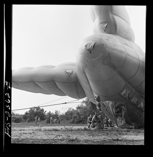 Parris Island, South Carolina. Special Marine units in training bedding down a big barrage balloon