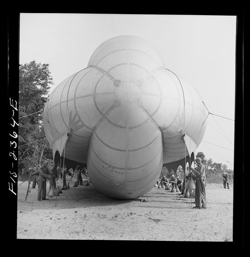 Parris Island, South Carolina. Special United States Marine units in training bedding down a big barrage balloon