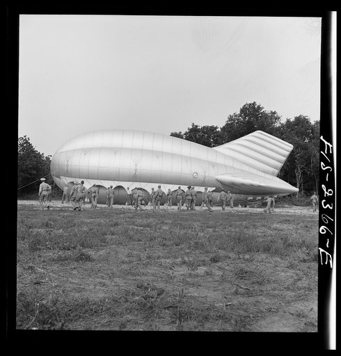 Parris Island, South Carolina. Special United States Marine units in training bedding down a big barrage balloon
