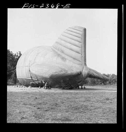 Parris Island, South Carolina. Special United States Marine units in training bedding down a big barrage balloon