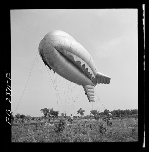 Parris Island, South Carolina. Tactical formations of barrage balloons prevent dive bombing and the strafing of important ground installations. The Leathernecks are developing an excellent technique in this method of protecting important locations from enemy aircraft