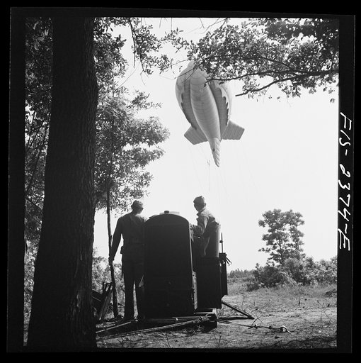 Untitled photo, possibly related to: Parris Island, South Carolina. Tactical formations of barrage balloons prevent dive bombing and the strafing of important ground installations. The Leathernecks are developing an excellent technique in this method of protecting important locations from enemy airc