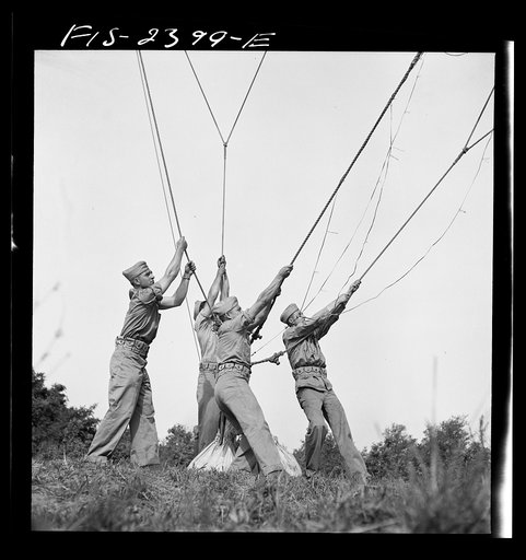 Parris Island, South Carolina. Special Marine units in training at Parris Island are learning how to bed down a big barrage balloon
