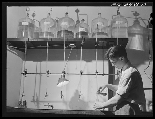 George Craker, freshman, working in the Soils Laboratory in Agricultural Hall, Iowa State College. Ames, Iowa