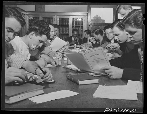 Untitled photo, possibly related to: Professor A.L. Anderson's class of seniors in pork production. Students are making a study of feed samples and are all majoring in Animal Husbandry. Iowa State College. Ames, Iowa