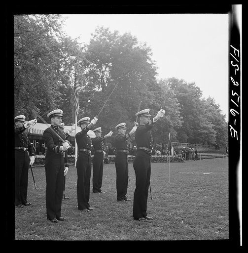 Annapolis, Maryland. Officers of the midshipmen's regiment, U.S. Naval Academy, giving their saber salute