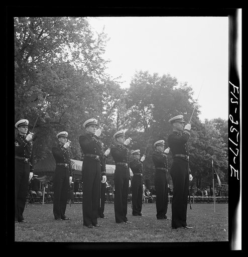 Annapolis, Maryland. Officers of the midshipmen's regiment, U.S. Naval Academy, giving their saber salute