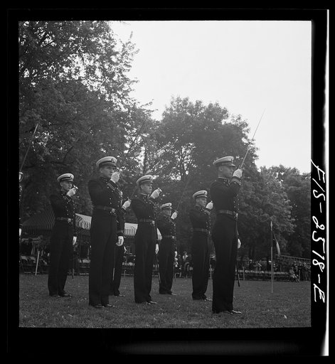 Annapolis, Maryland. Officers of the midshipmen's regiment, U.S. Naval Academy, giving their saber salute