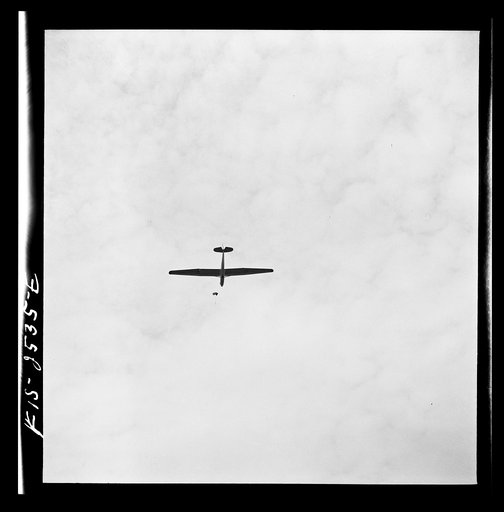 Parris Island, South Carolina. U.S. Marine Corps glider detachment training camp. Glider plane being towed through the sky