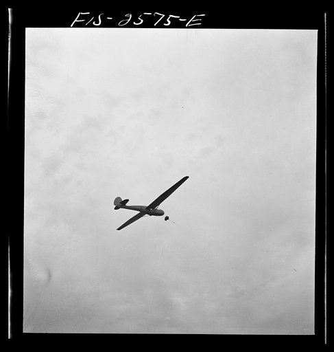 Parris Island, South Carolina. U.S. Marine Corps glider detachment training camp. Glider plane being towed through the sky