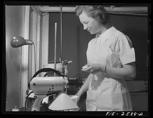 Untitled photo, possibly related to: A class in food preparation in the home economics department at Iowa State College. Ames, Iowa