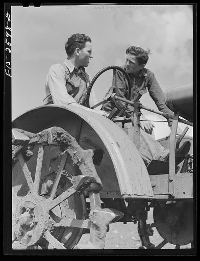 Dale and Gene discuss some quirks the tractor has developed since Gene was home last. Near Ames, Iowa