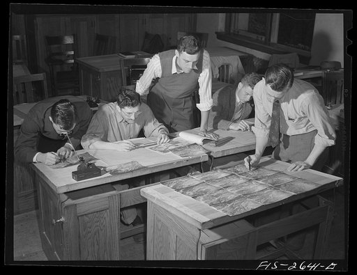 Senior forestry students studying aerial maps. Iowa State College. Ames, Iowa