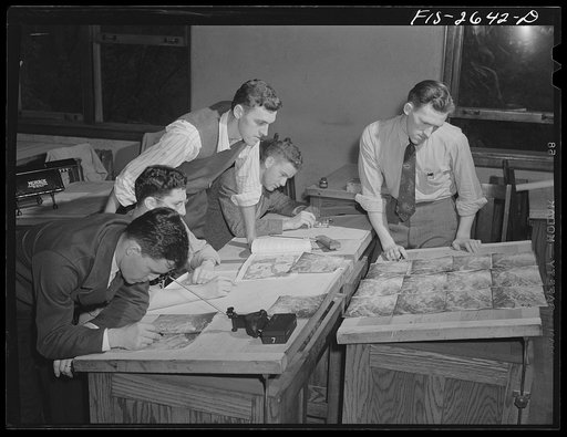 Senior forestry students studying aerial maps. Iowa State College. Ames, Iowa