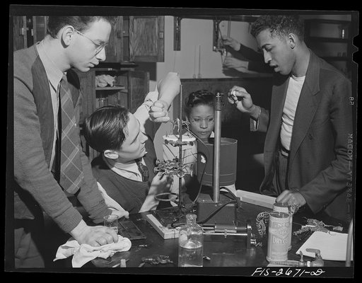 Postgraduate students studying physiology of the muscle. The experiment is with frogs' muscle tissue. Left to right: 1) J.S. Newcomer, graduate of University of Utah and majoring in organic chemistry. 2) A.E. Bell, graduate of University of Kentucky, genetics major. 3) Hiss Trondailer Jones, graduat
