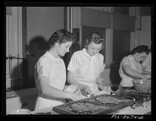 A class in food preparation in the home economics department at Iowa State College. Ames, Iowa