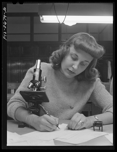Miss Norma Bauer of Greenfield, Iowa. Home economics student in a lab class on textiles. Iowa State College. Ames, Iowa