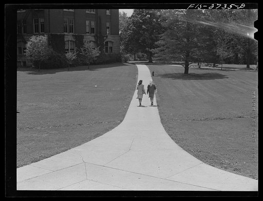 Untitled photo, possibly related to: On the campus between classes at Iowa State College. Ames, Iowa