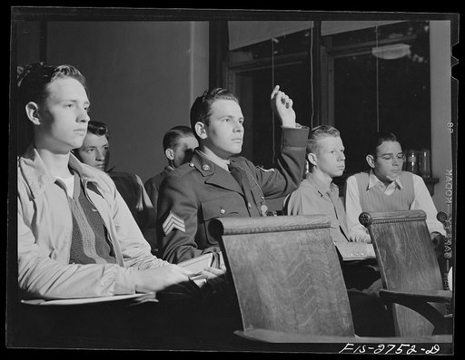 Untitled photo, possibly related to: Gene has Reserve Officers' Training Corps (ROTC) classes later in the day, so he wears his uniform all day long. This is an agronomy class in agricultural hall. Iowa State College, Ames, Iowa