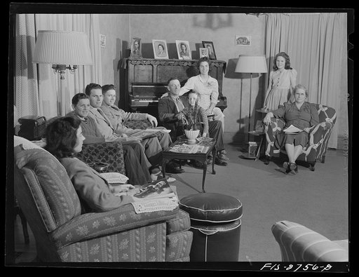 The Cooper family: left to right, Pat (twenty-two), Dale (fourteen), Gene (twenty), Francis (sixteen), Father (fifty), Tom (six), Dana (eighteen), Ann (twelve) and Mother (forty-seven). Near Ames, Iowa