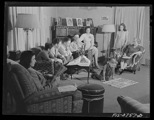 The Cooper family: left to right, Pat (twenty-two), Dale (fourteen), Gene (twenty), Francis (sixteen), Father (fifty), Tom (six), Dana (eighteen), Ann (twelve) and Mother (forty-seven). Near Ames, Iowa