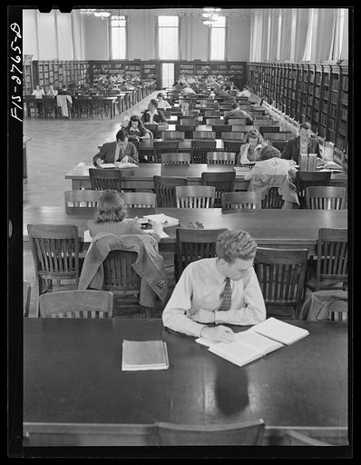 Untitled photo, possibly related to: In the library at Iowa State College. Ames, Iowa