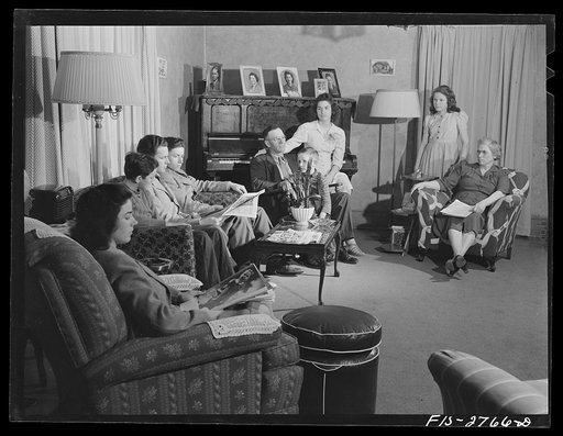 Untitled photo, possibly related to: The Cooper family: left to right, Pat (twenty-two), Dale (fourteen), Gene (twenty), Francis (sixteen), Father (fifty), Tom (six), Dana (eighteen), Ann (twelve) and Mother (forty-seven). Near Ames, Iowa