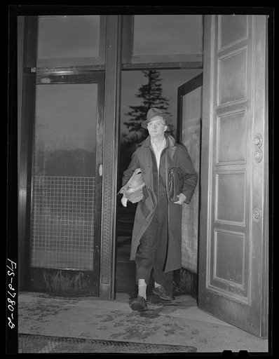 Virgil Reinhart, from Carroll, Iowa is a freshmen in veterinary medicine. Entering Memorial Union during the lunch hour. Iowa State College. Ames, Iowa