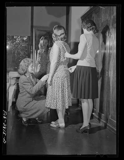 Left to right: Jean Guy, Charlotte Grundell, and Jean Pidgeon in a clothing laboratory in the home economics building at Iowa State College. Ames, Iowa