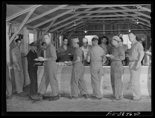 Sergeant pilots in training are served in their own mess hall at Lake Muroc, California