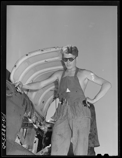 Armorer and airplane mechanic at Lake Muroc, California