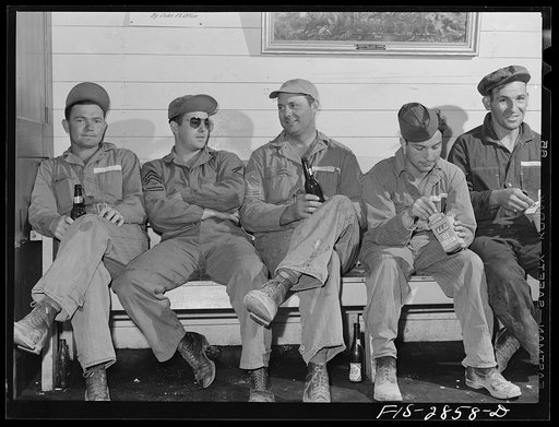 The post exchange is popular with the "Flying Sergeants" at Lake Muroc. Here is a group of them enjoying refreshments