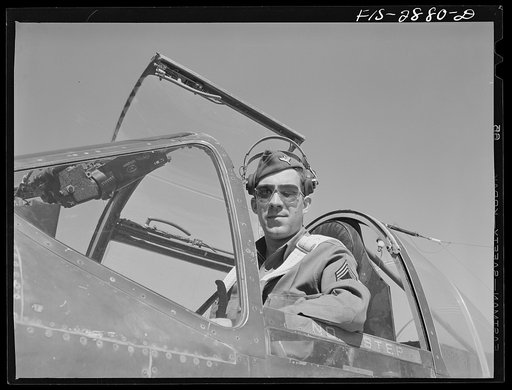 "Flying Sergeant" in the cockpit of his interceptor plane. Lake Muroc, California