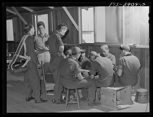 Playing cards is one of the favorite recreations of "Flying Sergeants" at Lake Muroc, California